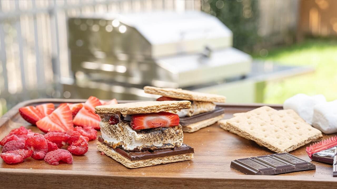 smores tray with fresh berries