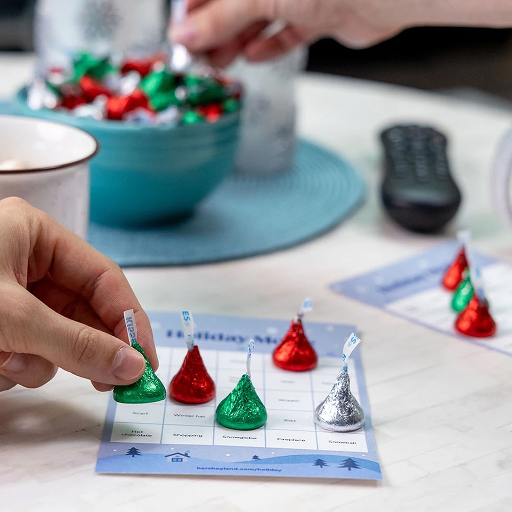 holiday movie bingo sheet with hersheys kisses covers