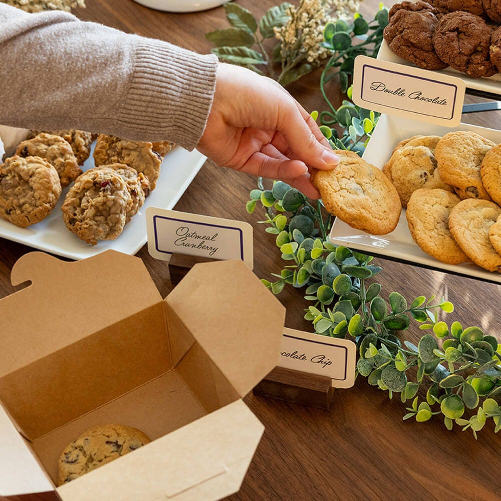 box being filled with homemade cookies
