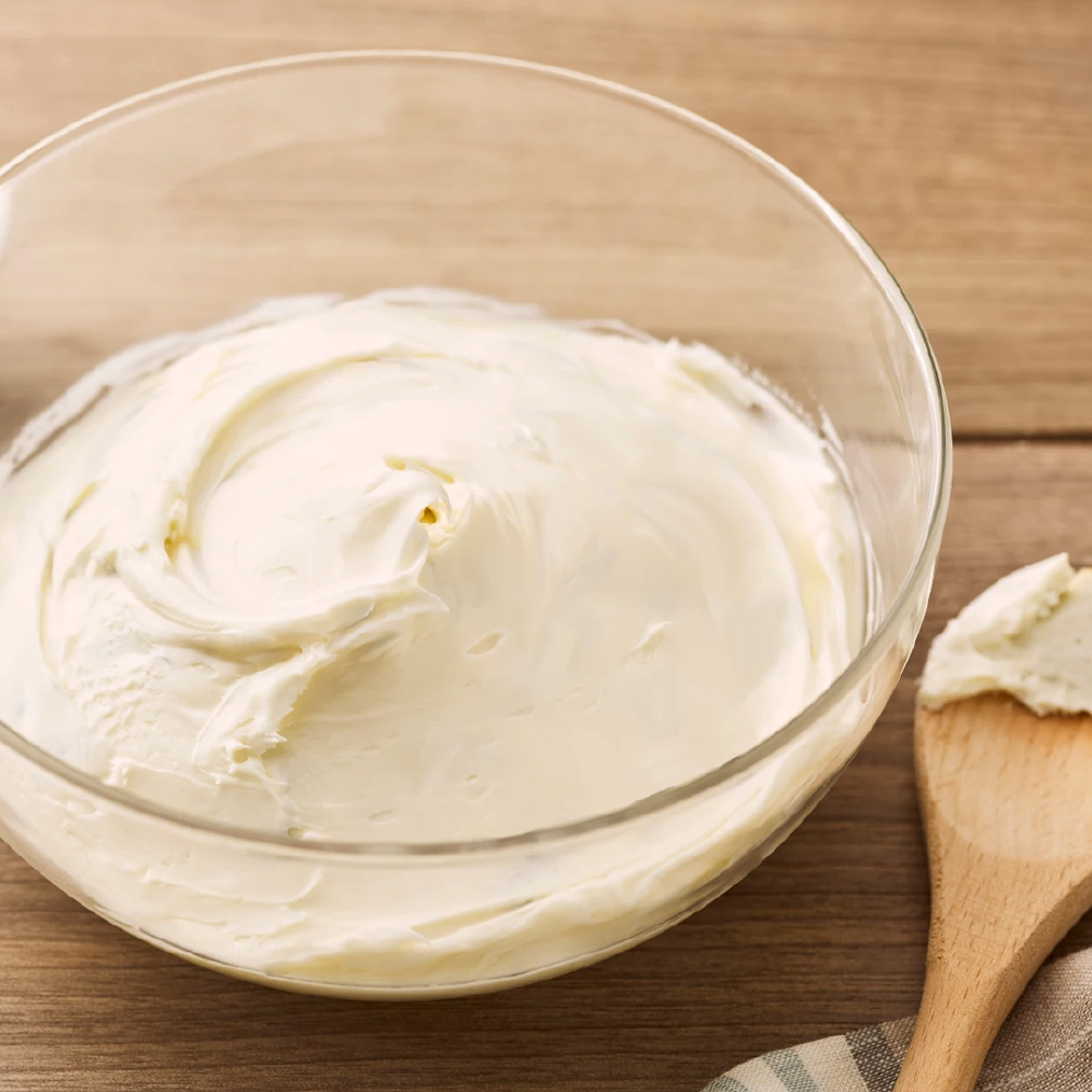 bowl of vanilla frosting