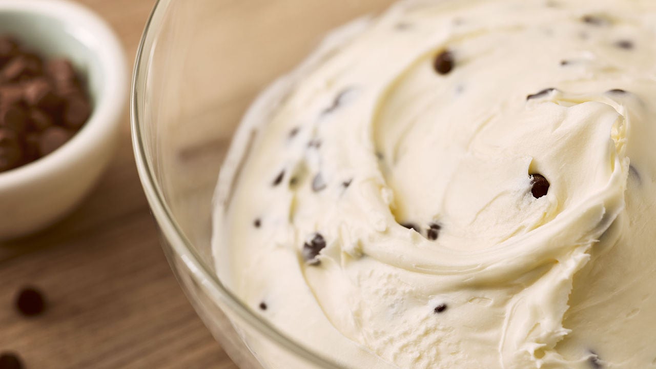 glass bowl of vanilla buttercream frosting