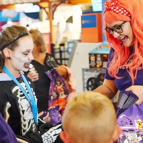 trick or treaters getting candy at hersheys chocolate world