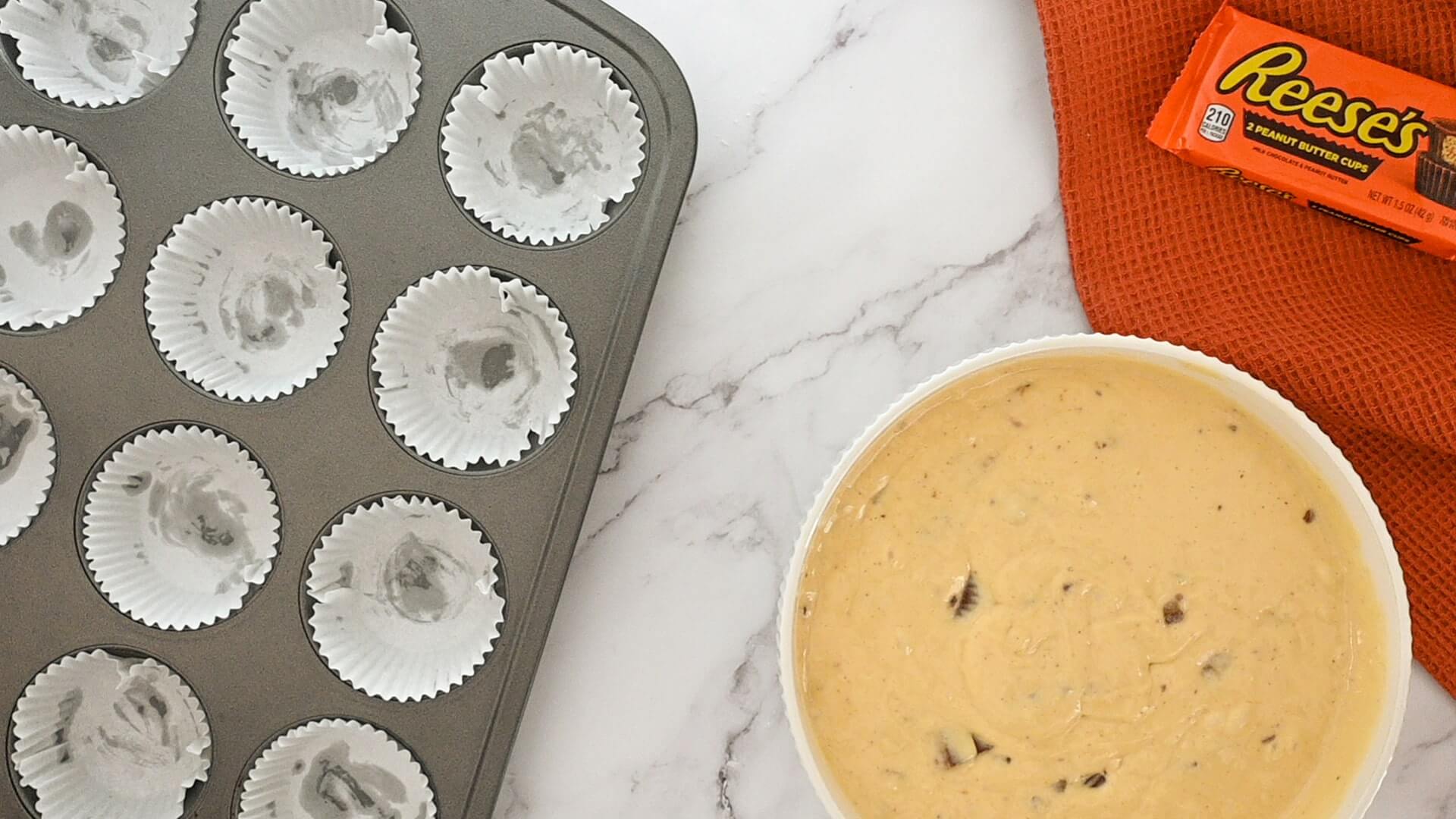 cupcake batter about to be added to cupcake liners