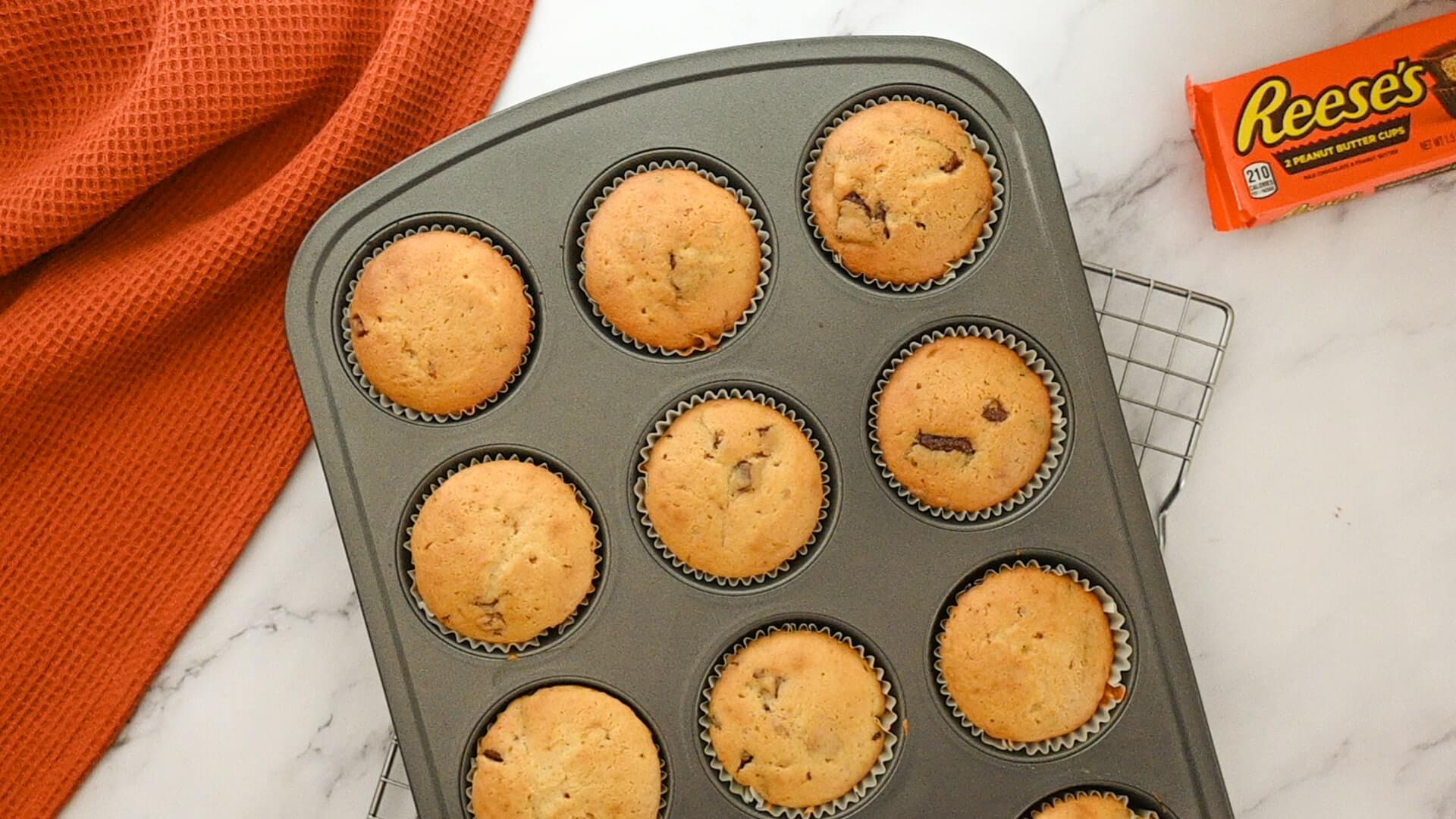 baked cupcakes cooling slightly in pan
