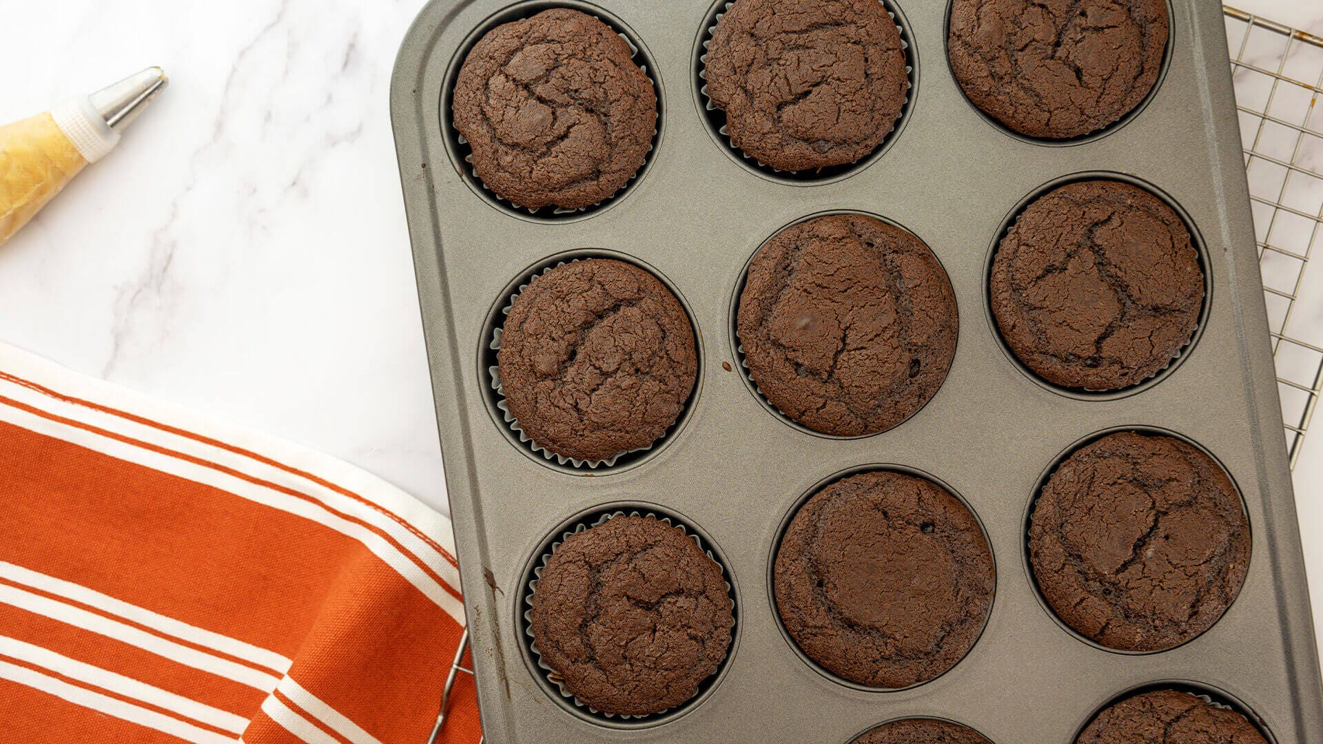 cupcakes cooling on wire rack