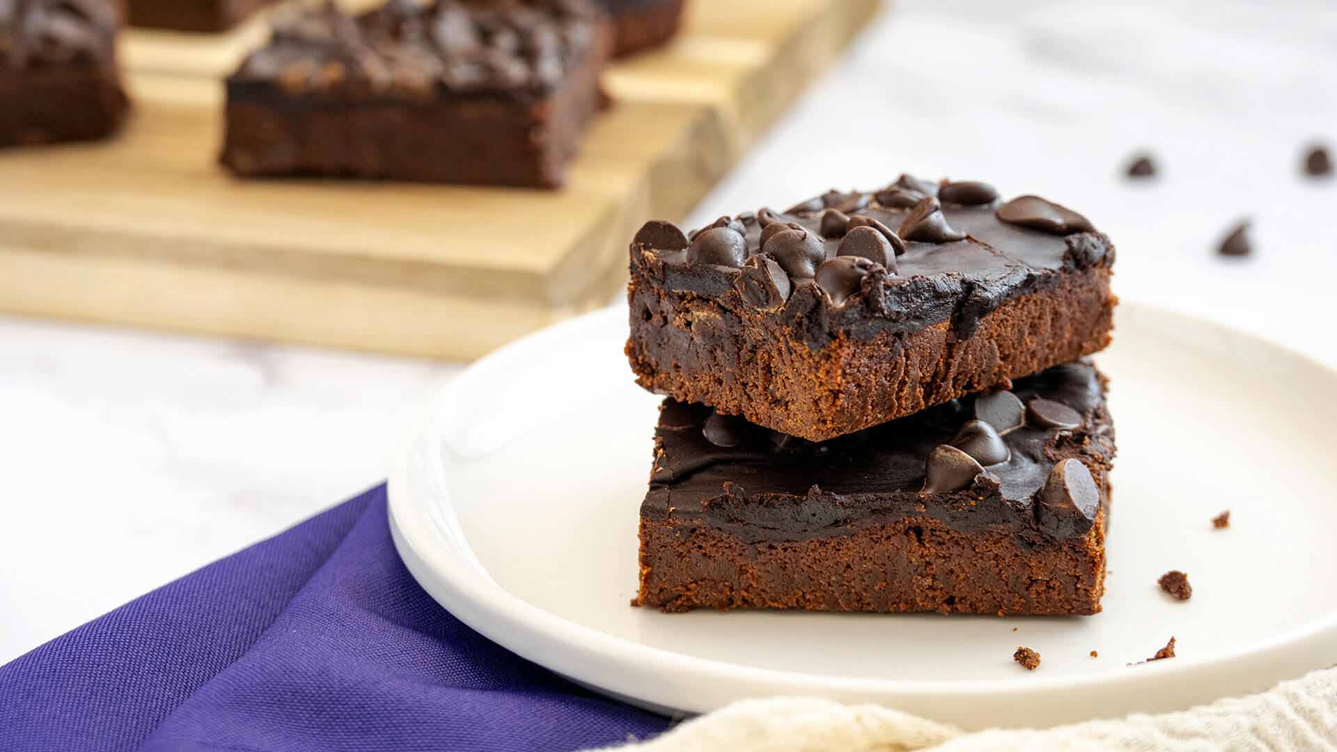 stack of hersheys triple chocolate brownies on a serving dish