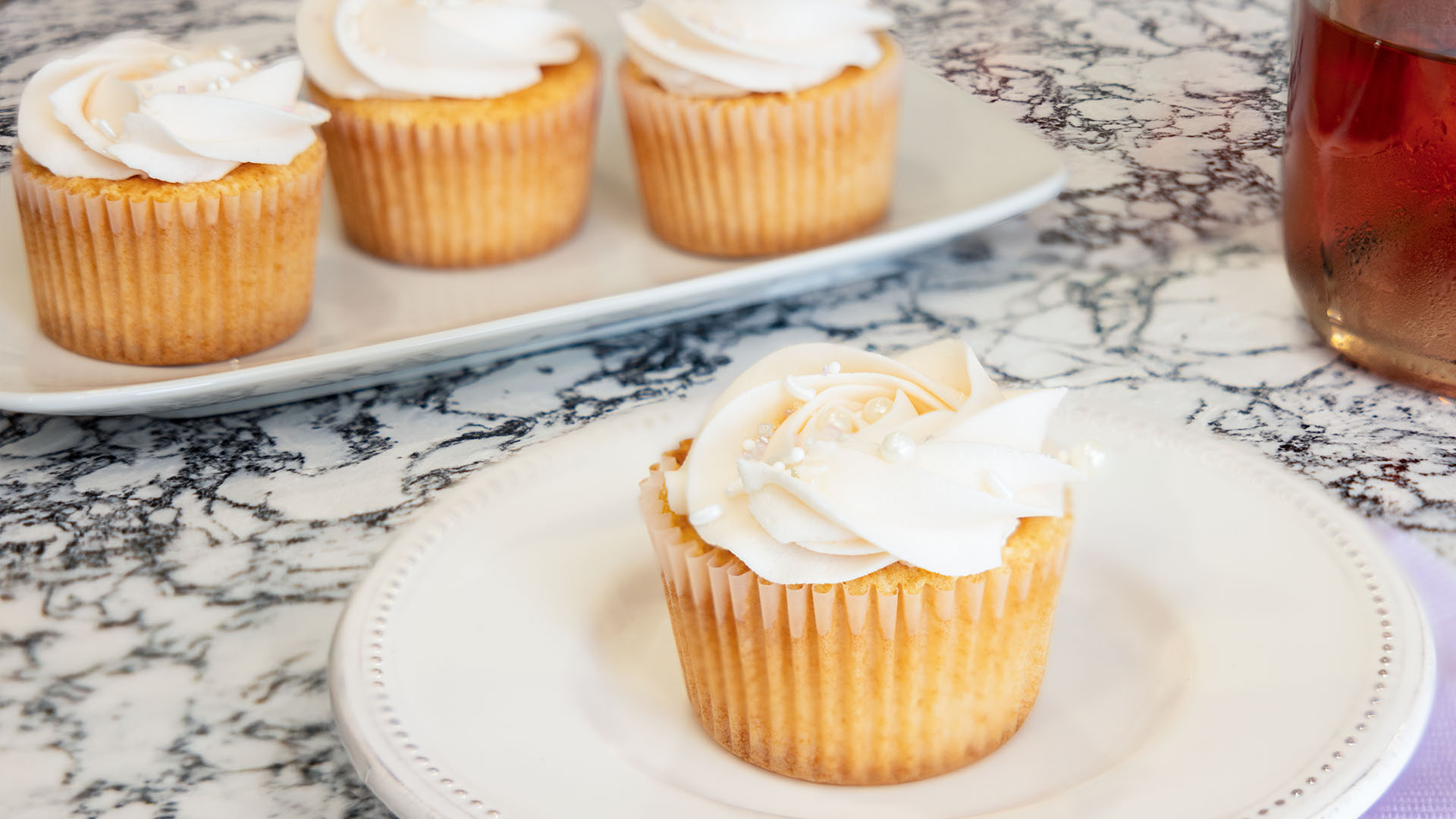 tray of pink champagne cupcakes