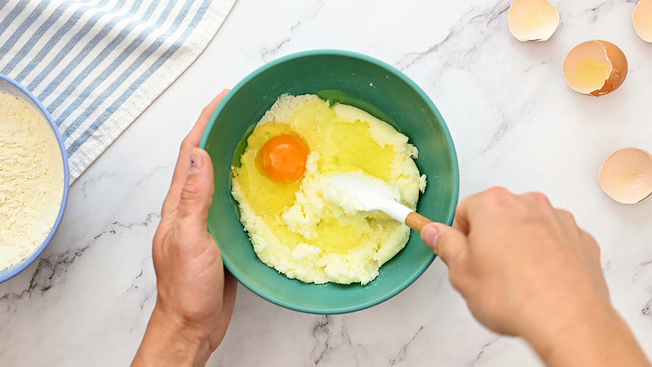 adding an egg and egg white into the dry ingredient mixture