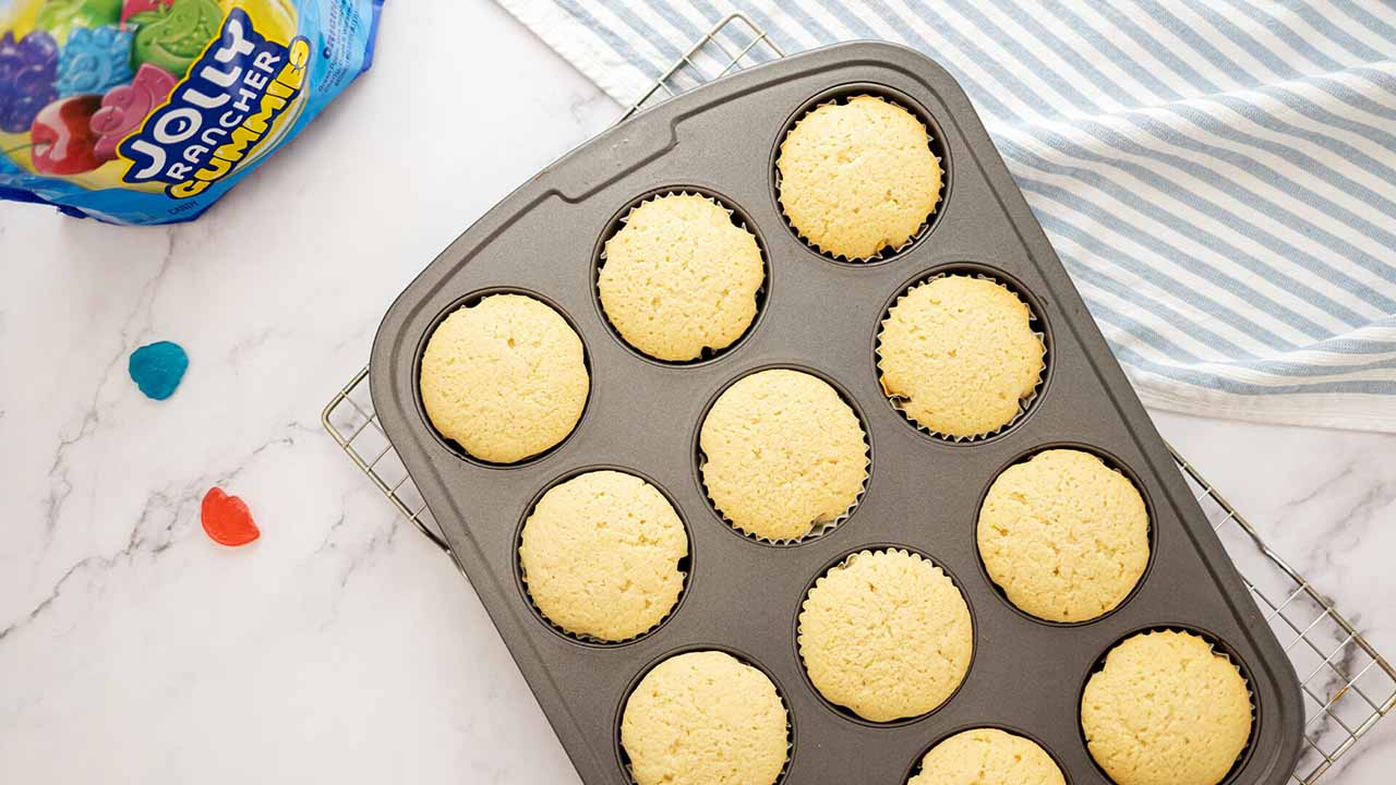 remove cupcakes from oven and ensure cupcakes are done baking