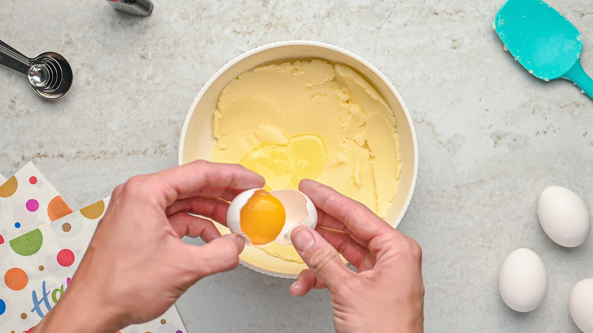 egg whites going in mixing bowl