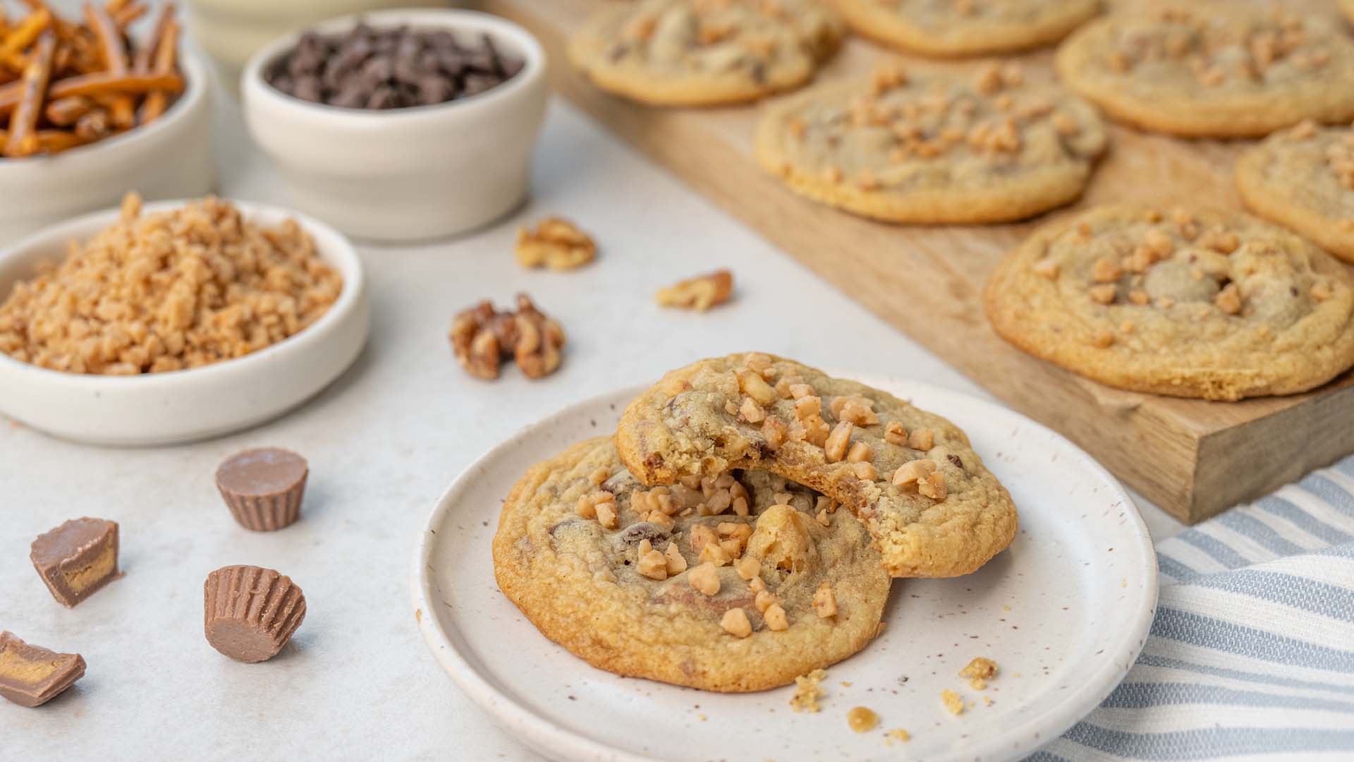 tray and plate of kitchen sink cookies with a bite taken