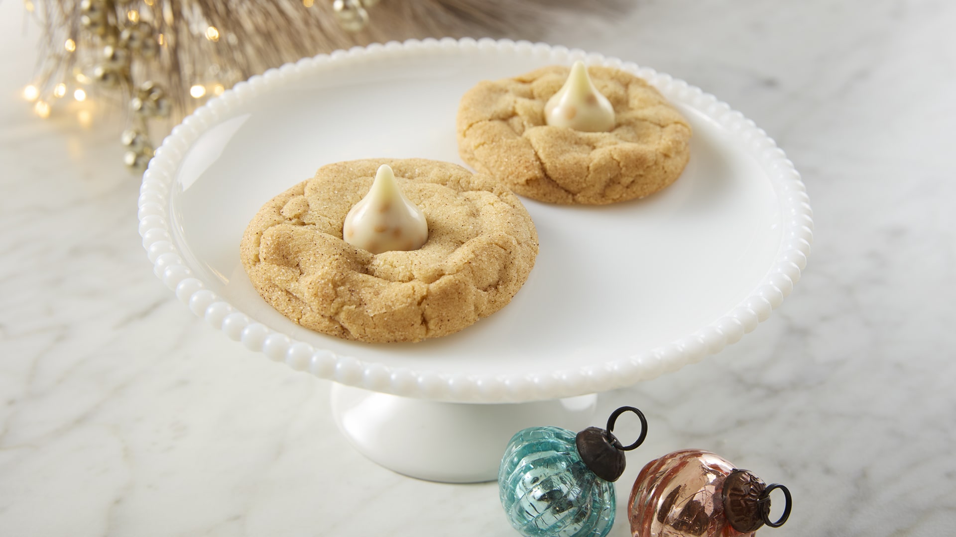 two snickerdoodle blossoms on a plate