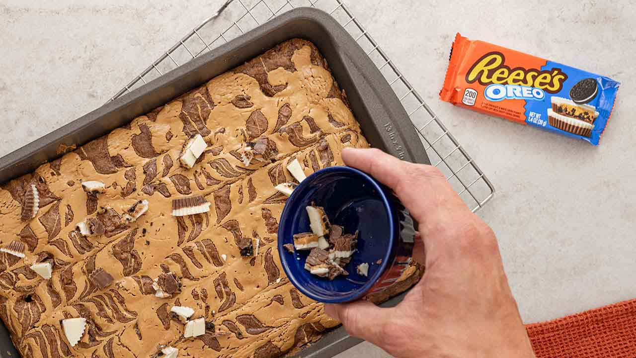topping brownies with additional reeses oreo peanut butter cups