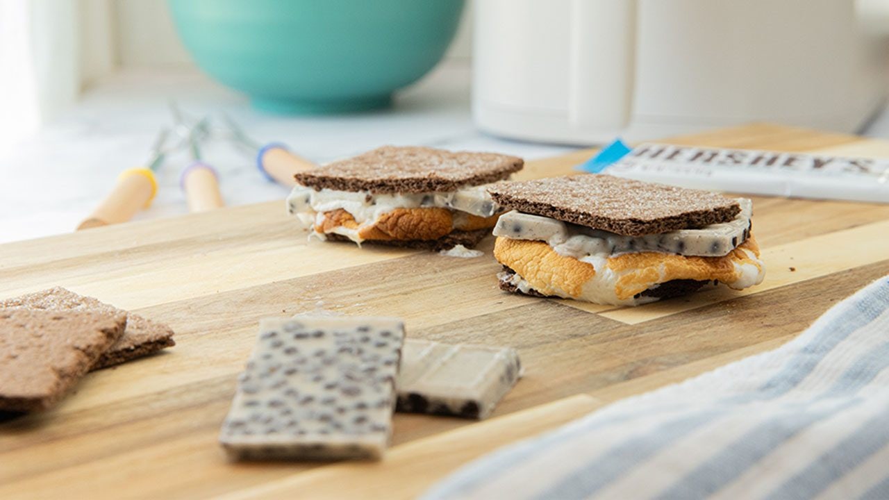 cookies n creme smores on wooden serving board