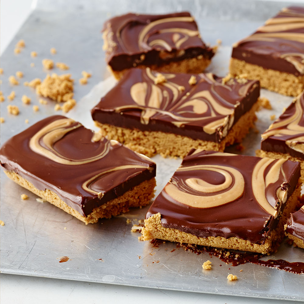 tray of no bake peanut butter chocolate bars