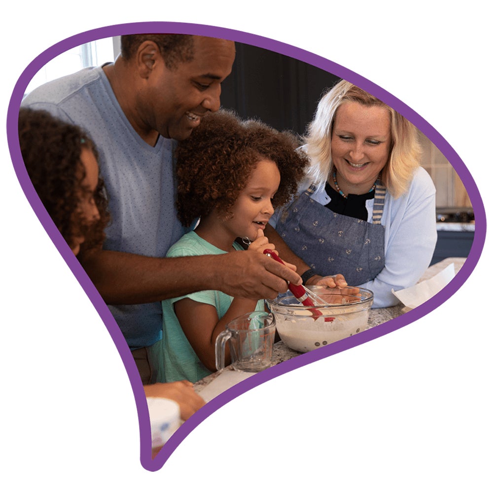 family baking together in the kitchen