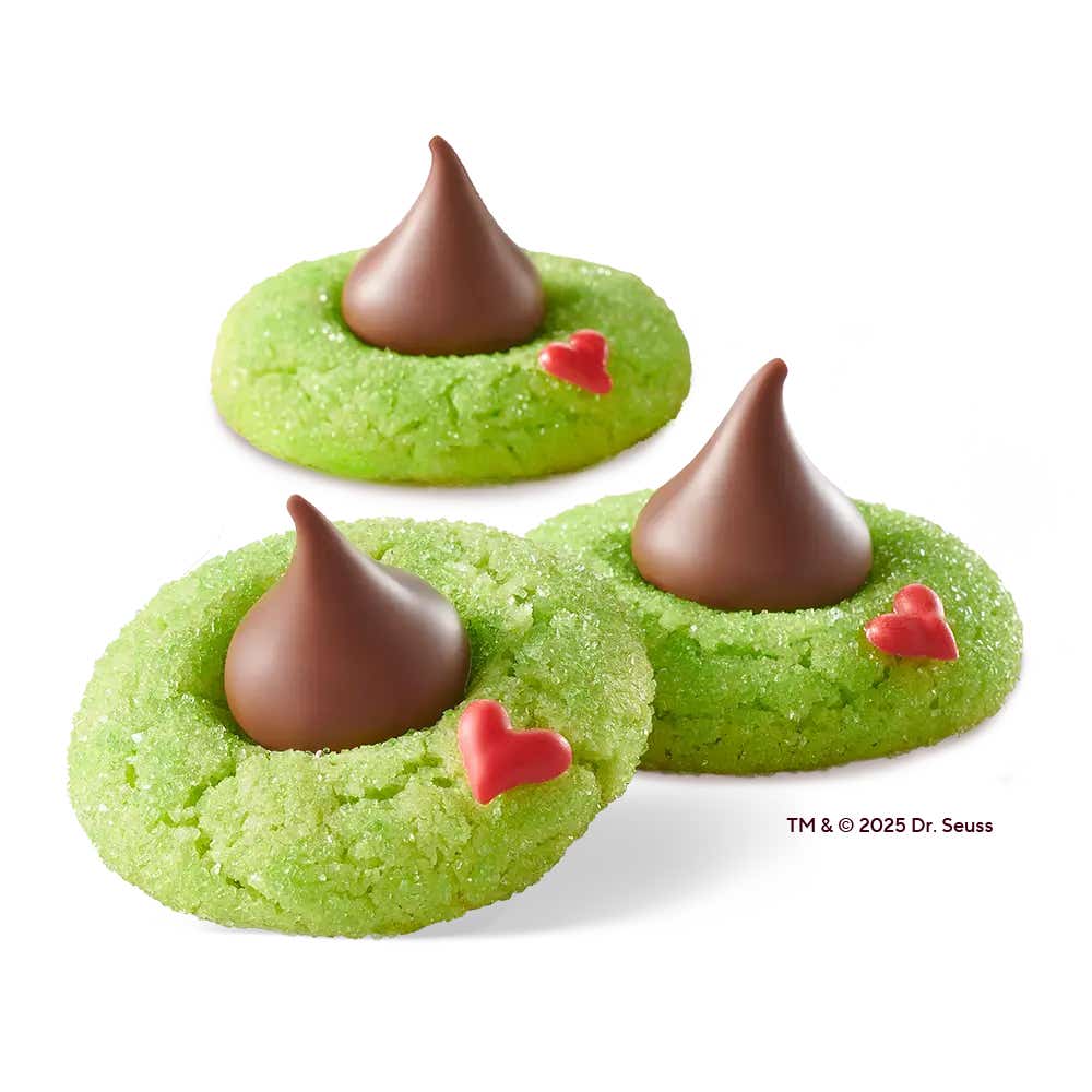 three grinch themed blossom cookies